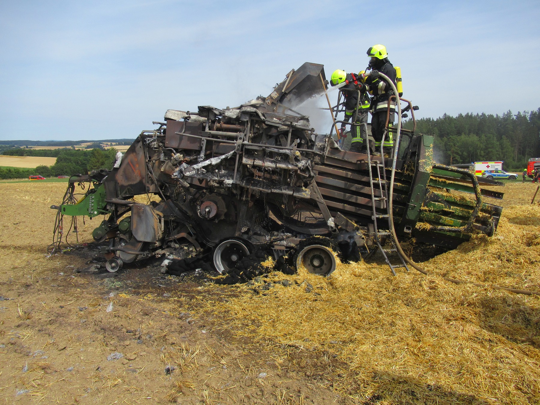 Großpackenpresse Raub der Flammen